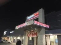 channel-letters-banner-outdoor-storefront-building-illuminated-backlit-sign-333x250-1-300x225